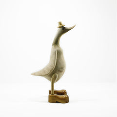Small hand carved bamboo wood duck with at and boots