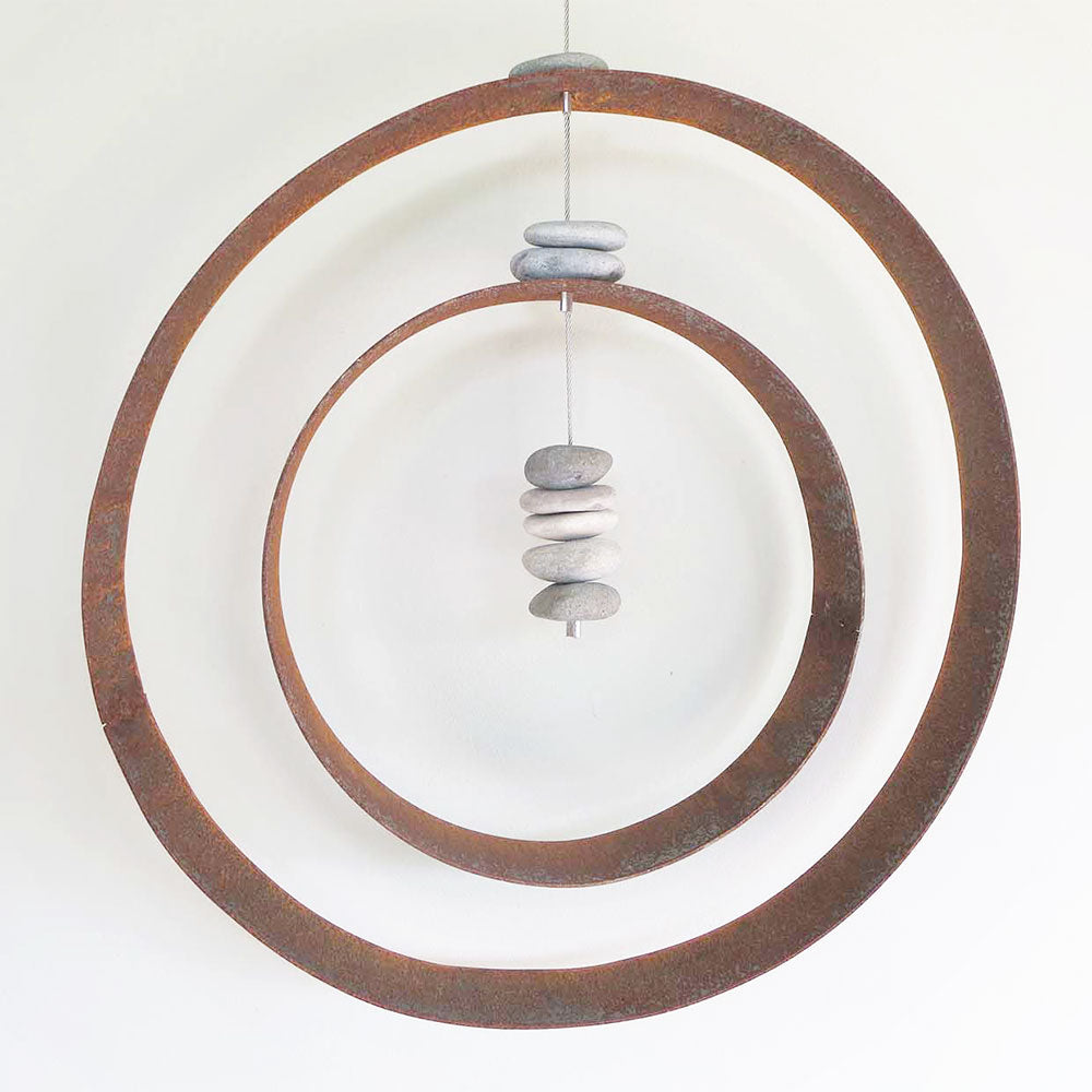 Outdoor wall hanging made form metal and stones