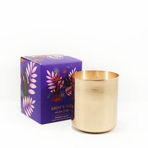 candle in copper jar with midnight velvet fragrance