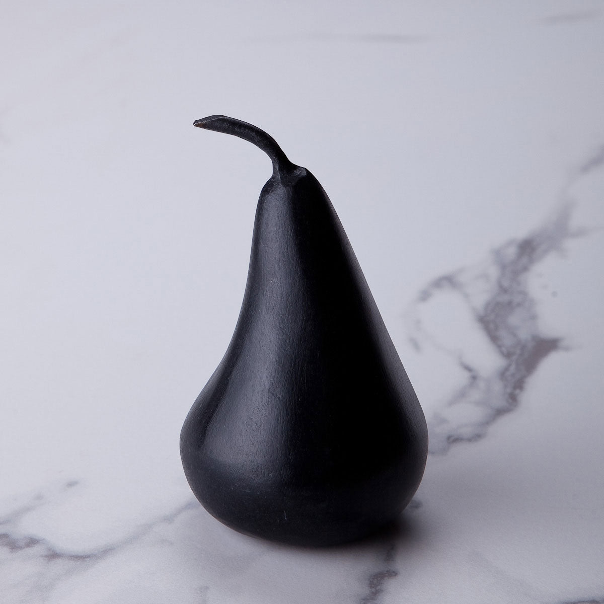 Small black marble pear